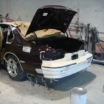 Before and after photographs of a damaged Chevy Impala that was repaired by Elite Paint & Body Shop in West Palm Beach, Florida.